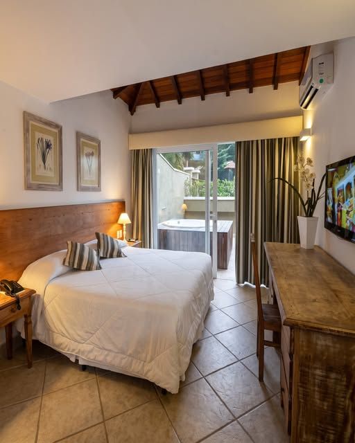 Suíte Luxo com hidromassagem na varanda na Pousada dos Búzios